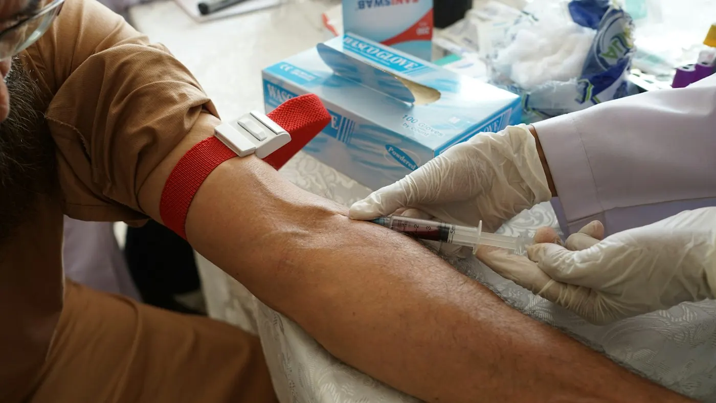 Blood sample being collected