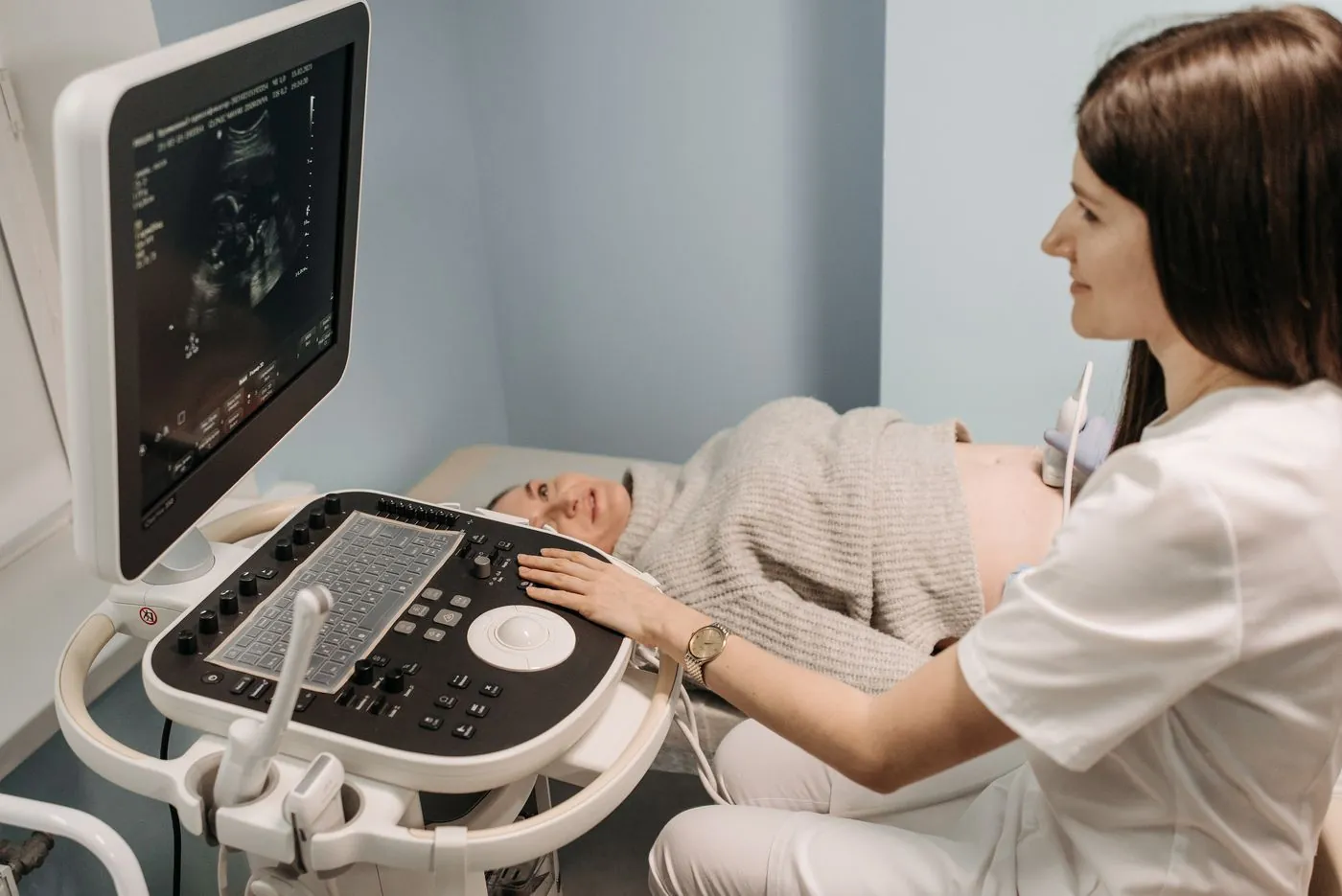 Woman doctor doing an ultrasound scan